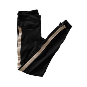 Athleta XS leggings - black with silver beige reflective stripe on each side.